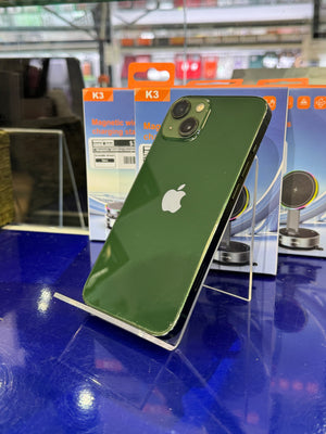 Green smartphone on a stand with an Apple logo