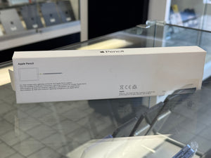 Apple Pencil box on a glass surface with blurred background