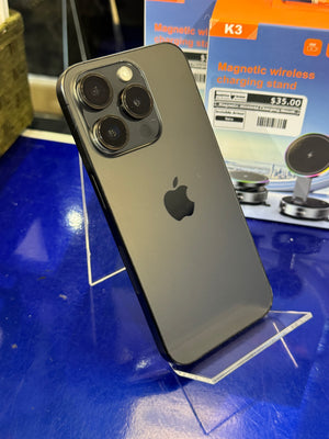 Black smartphone with Apple logo on a blue surface