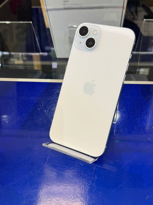 White smartphone with Apple logo on a blue surface