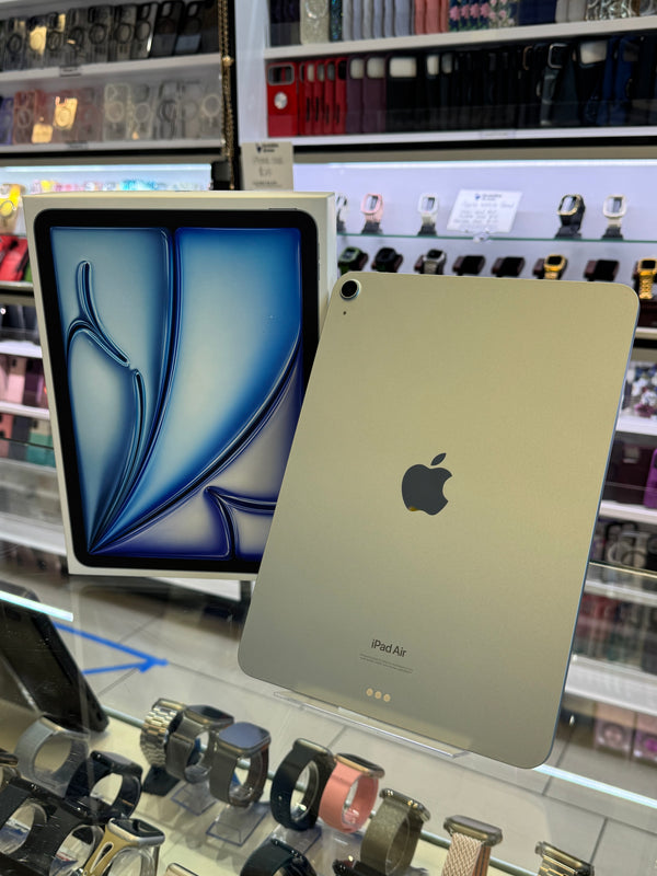 iPad displaying Apple logo with the Apple box next to it in a store setting