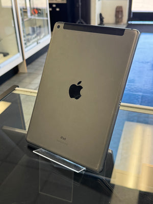 iPad on a stand with an Apple logo in a store setting