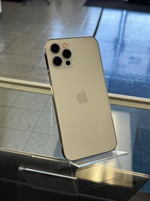 Silver iPhone 11 Pro on a stand with blurred background