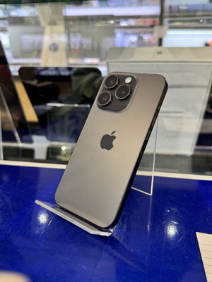 Smartphone on a stand with blurred store interior background