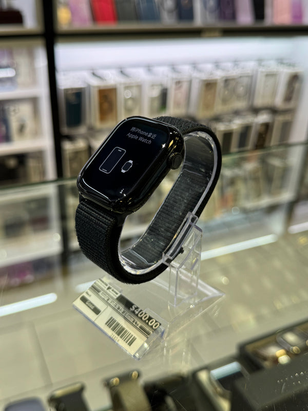 Smartwatch on display with a price tag in an electronics store
