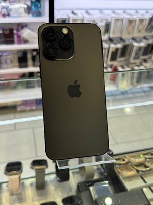 Black smartphone with Apple logo on a reflective surface