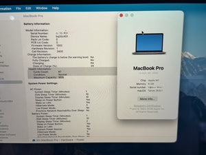 A close-up of a computer screen showing the macOS System Settings interface with MacBook Pro battery and power information, alongside a large MacBook Pro product card on the right.