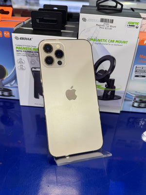 Gold smartphone with magnetic car mount on a blue surface
