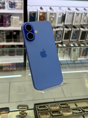 Blue iPhone on display in a store with phone cases in the background