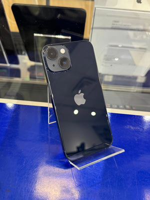 Black smartphone with Apple logo on a blue surface