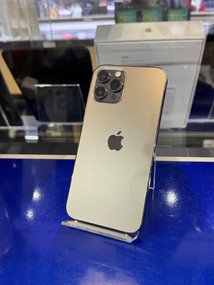 Gold iPhone with Apple logo on a blue surface