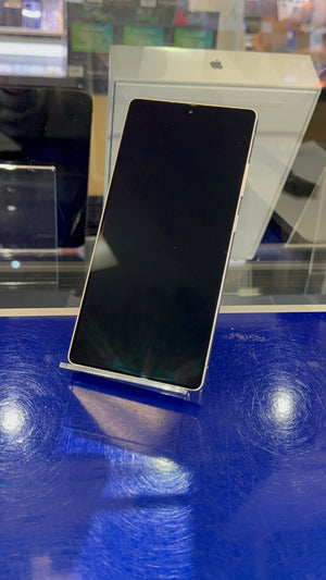 Smartphone on a stand with a blurred background