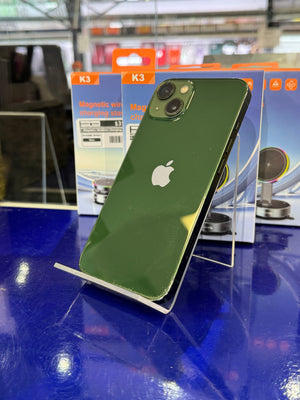 Green smartphone on a stand with 'K3' packaging in the background