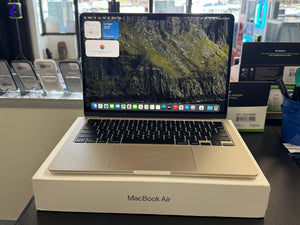 MacBook Air laptop on display in a store setting