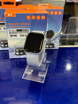 Smartwatch on a clear stand. 