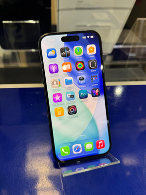 Smartphone with app icons on a reflective surface