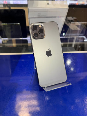 Silver iPhone with Apple logo on a reflective surface