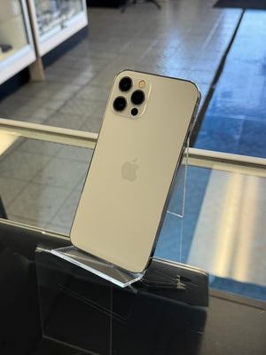 Silver smartphone with Apple logo on a reflective surface
