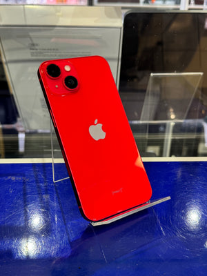 Red smartphone with Apple logo on a blue surface