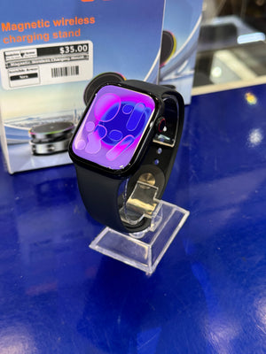 Smartwatch on a stand with a blue background