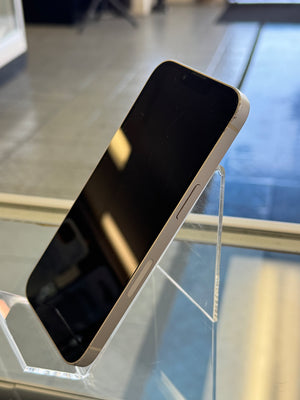 Smartphone on a clear stand with a blurred background