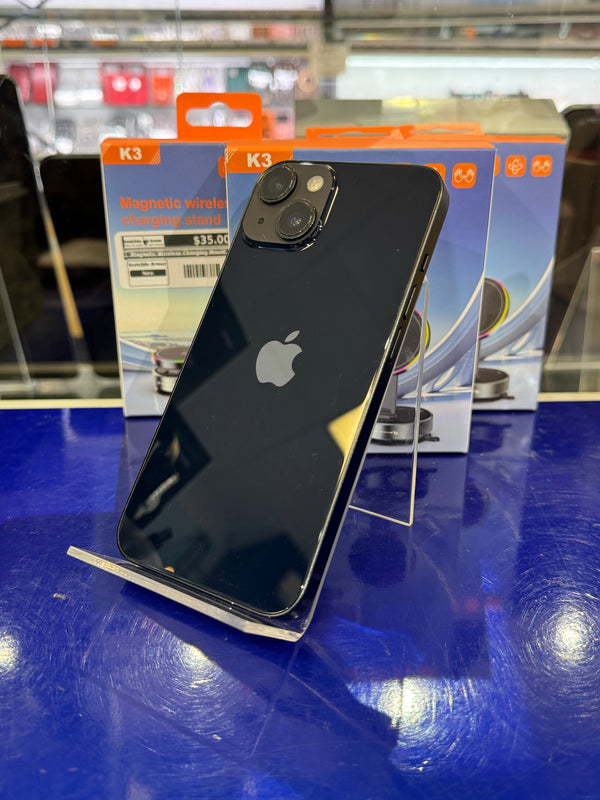 Black smartphone with Apple logo on a blue surface