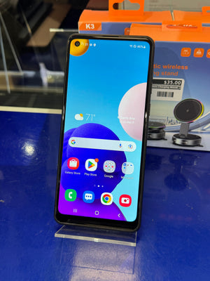 Smartphone with a colorful display on a stand.
