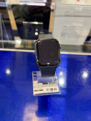 Smartwatch on display with a price tag in a store setting