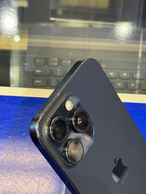 Close-up of an iPhone's camera module with a blurred background