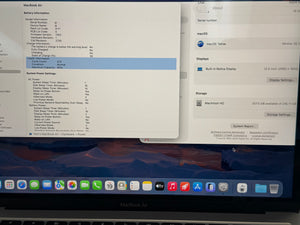 MacBook Air screen showing system information and display settings.