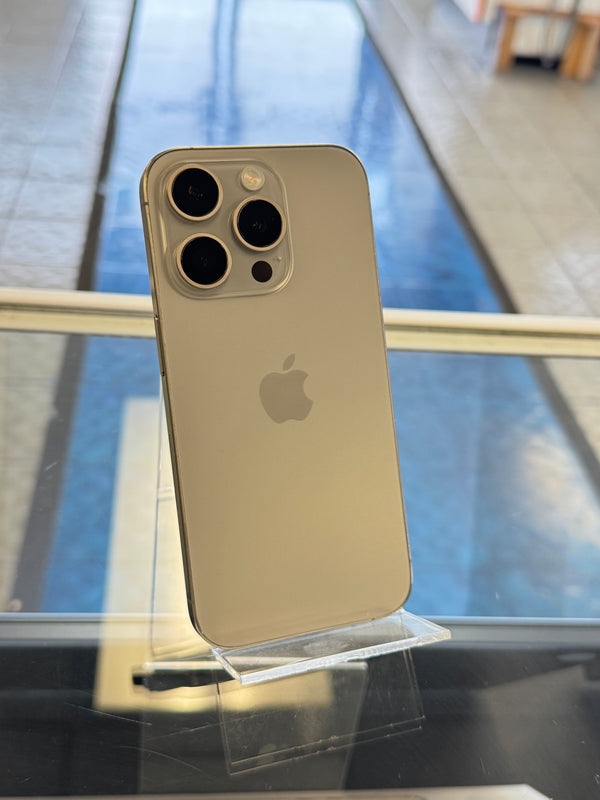 iPhone 12 Pro Max on a stand with blurred background