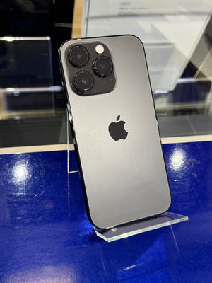 Silver Apple smartphone on a stand with a blue background