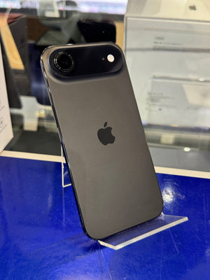 Black smartphone with Apple logo on a reflective surface