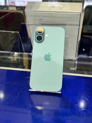 Green smartphone on a stand with a blurred background