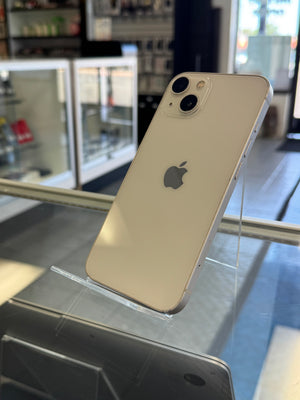 Silver iPhone 11 Pro on display with Apple logo in a store setting
