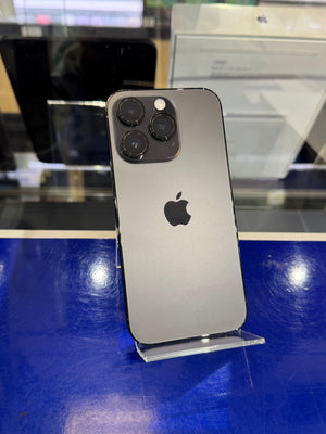Silver iPhone with Apple logo on a blue surface