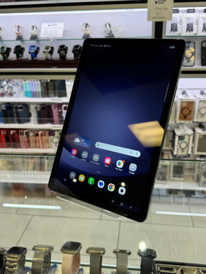Tablet device with a screen displaying app icons in a store setting