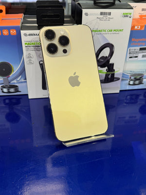 Gold iPhone with Apple logo on a blue surface