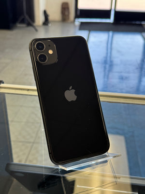 Black smartphone with Apple logo on a reflective surface