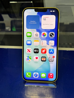 Smartphone with app icons displayed on a blue background