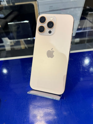 iPhone 12 Pro Max on a blue surface