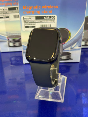 Magnetic wireless charging stand on a blue display with price tag
