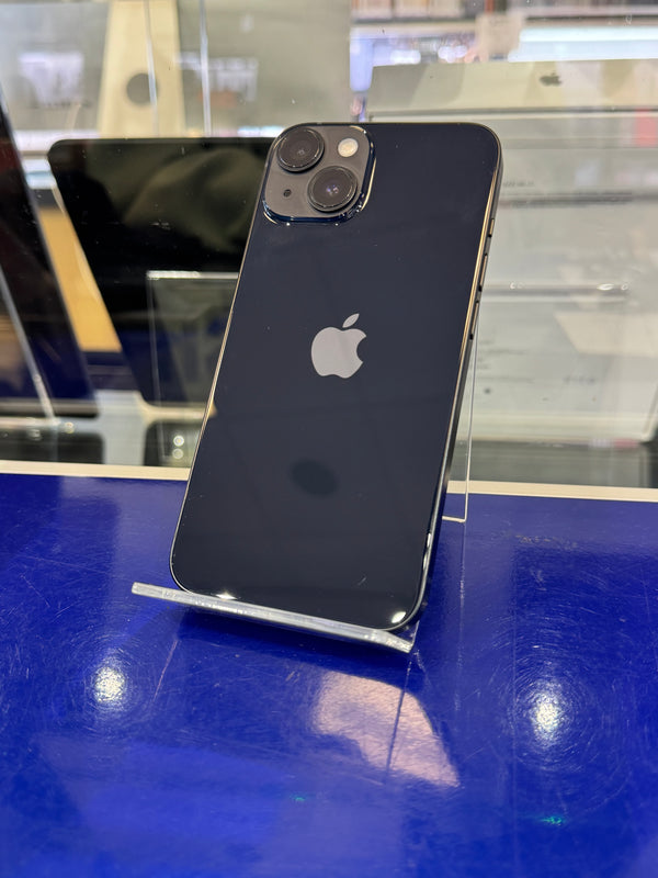 Black smartphone with Apple logo on a blue surface