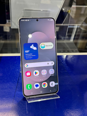 Smartphone on a stand with a blue background