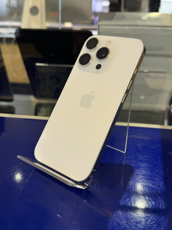 White smartphone with Apple logo on a blue background