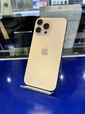 Gold iPhone with Apple logo on a blue surface