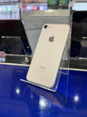 iPhone with Apple logo on a blue surface