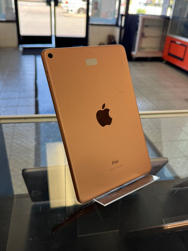 iPad on a stand with blurred indoor background