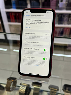 Smartphone displaying a settings screen with a blurred store interior background