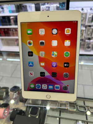 Tablet with app icons displayed on a stand in a store setting
